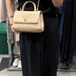 CHANEL Beige Coco handle flap bag