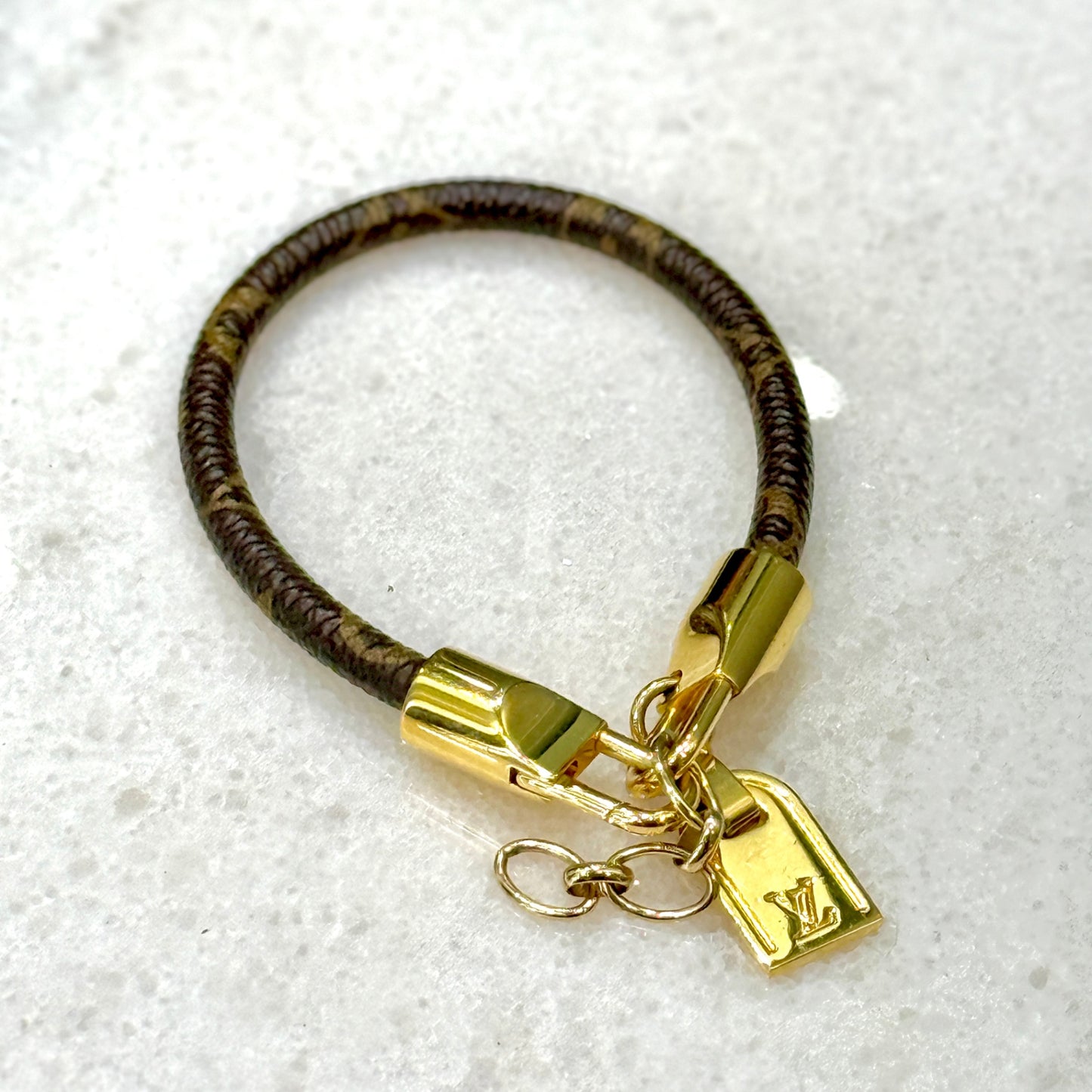 LOUIS VUITTON Monogram Leather Charm Bracelet