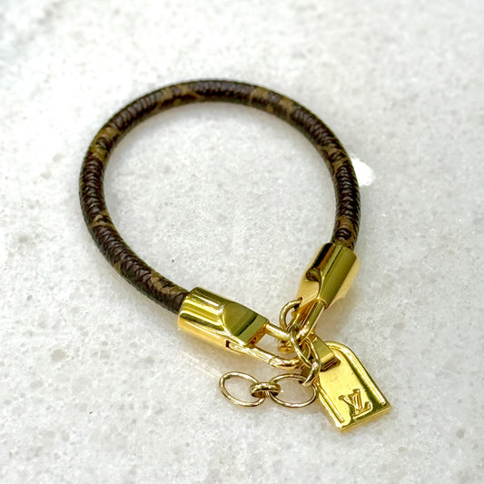 LOUIS VUITTON Monogram Leather Charm Bracelet