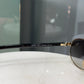 PRADA Black Round Lens Sunglasses