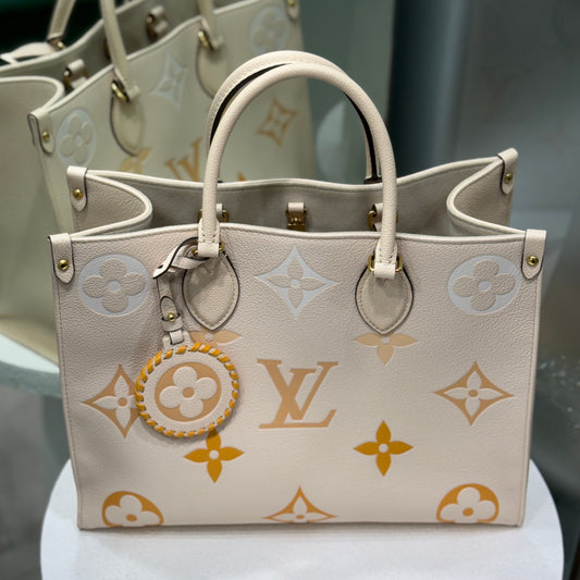 LOUIS VUITTON OnTheGo MM Tote Cream Saffron