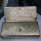 SAINT LAURENT Gold Clutch