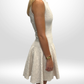ALAÏA Creme Patterned Mini Dress