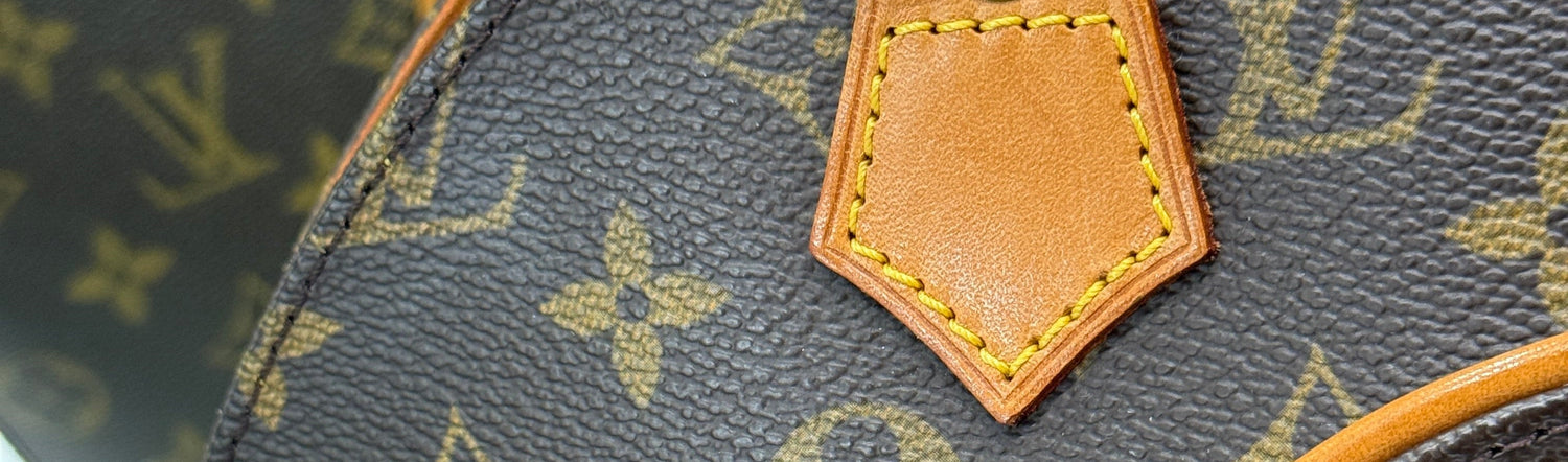 Close-up of a Louis Vuitton handbag with monogram pattern